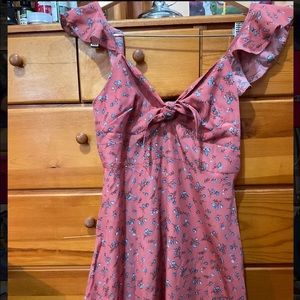 Pink front tie dress.